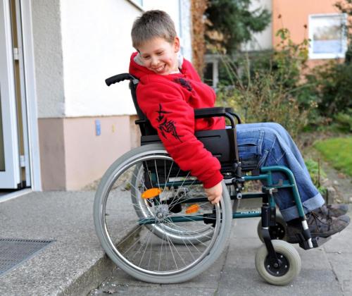 boy-in-wheelchair-at-step